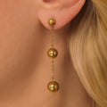 Gold ball earrings
