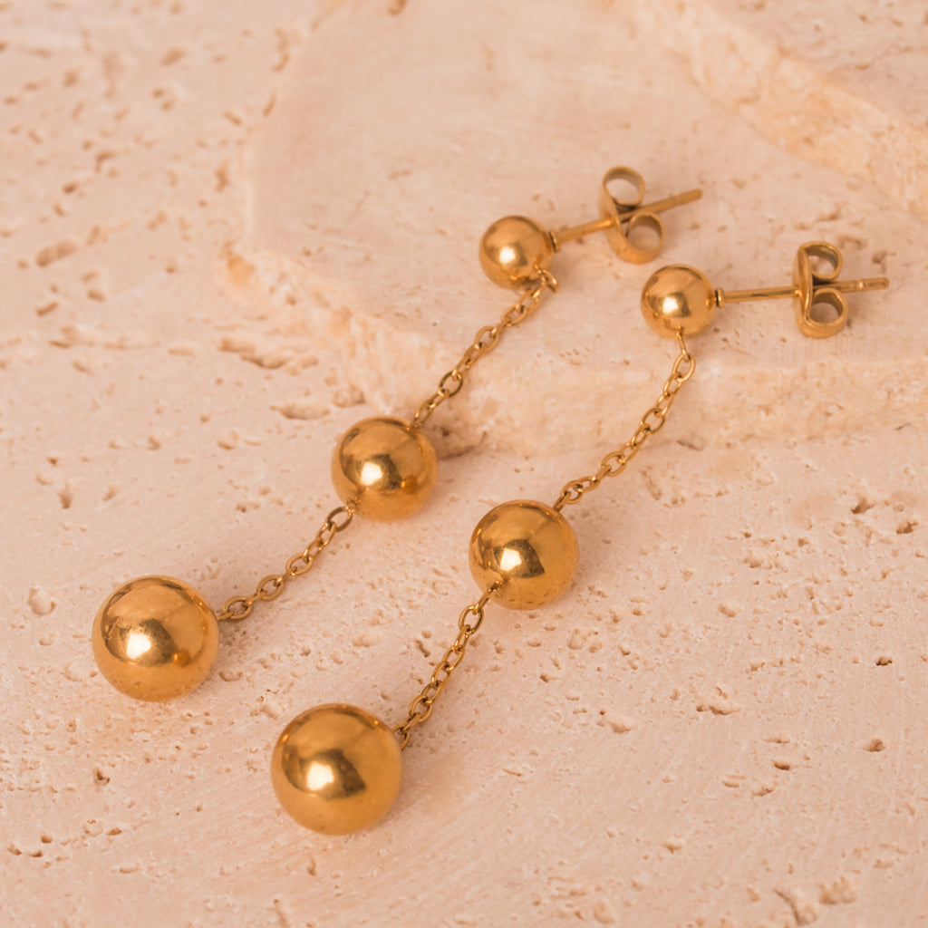 Gold chain and balls earrings