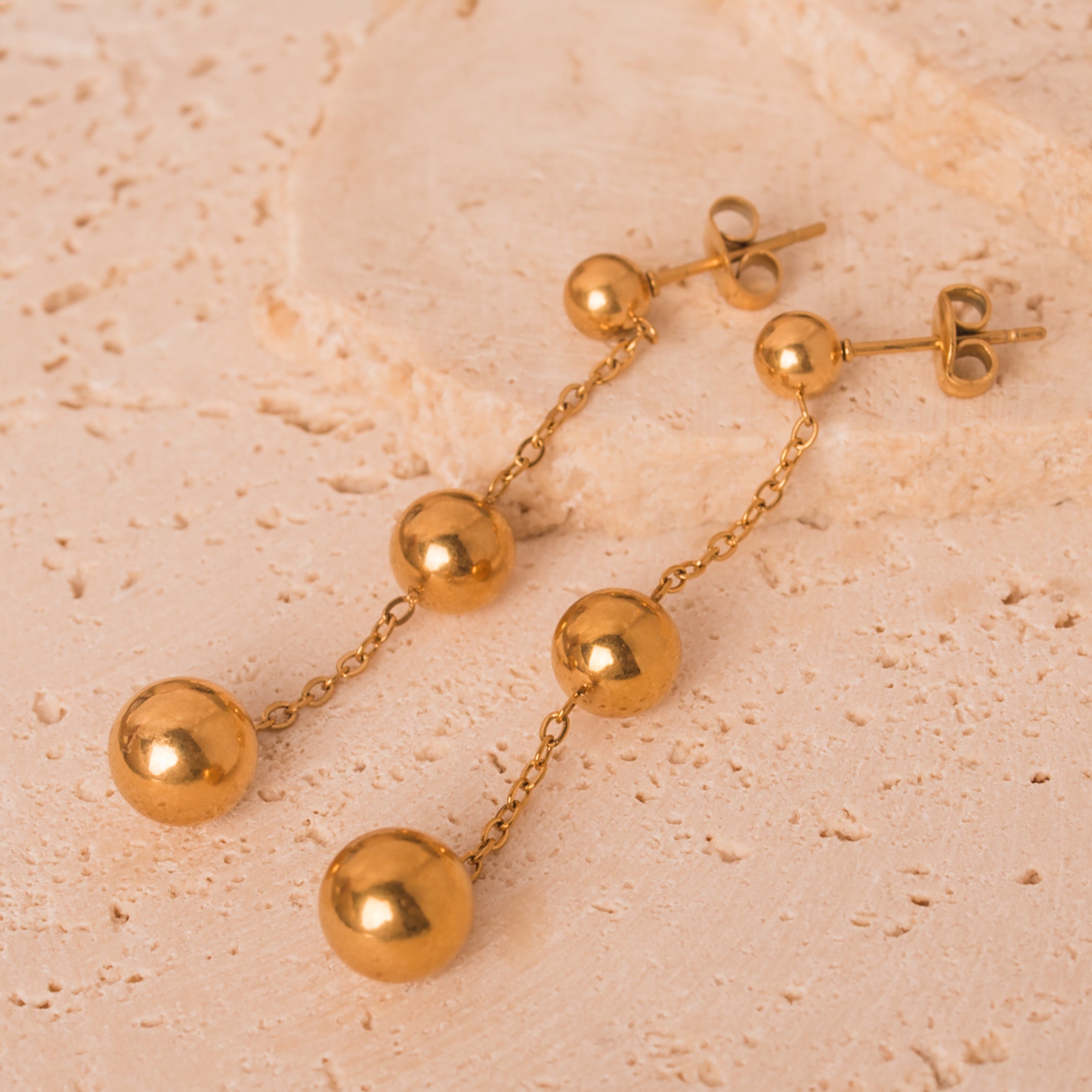 Gold chain and balls earrings