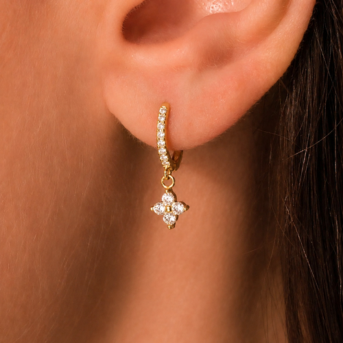 Gold huddie earring with a clover design 