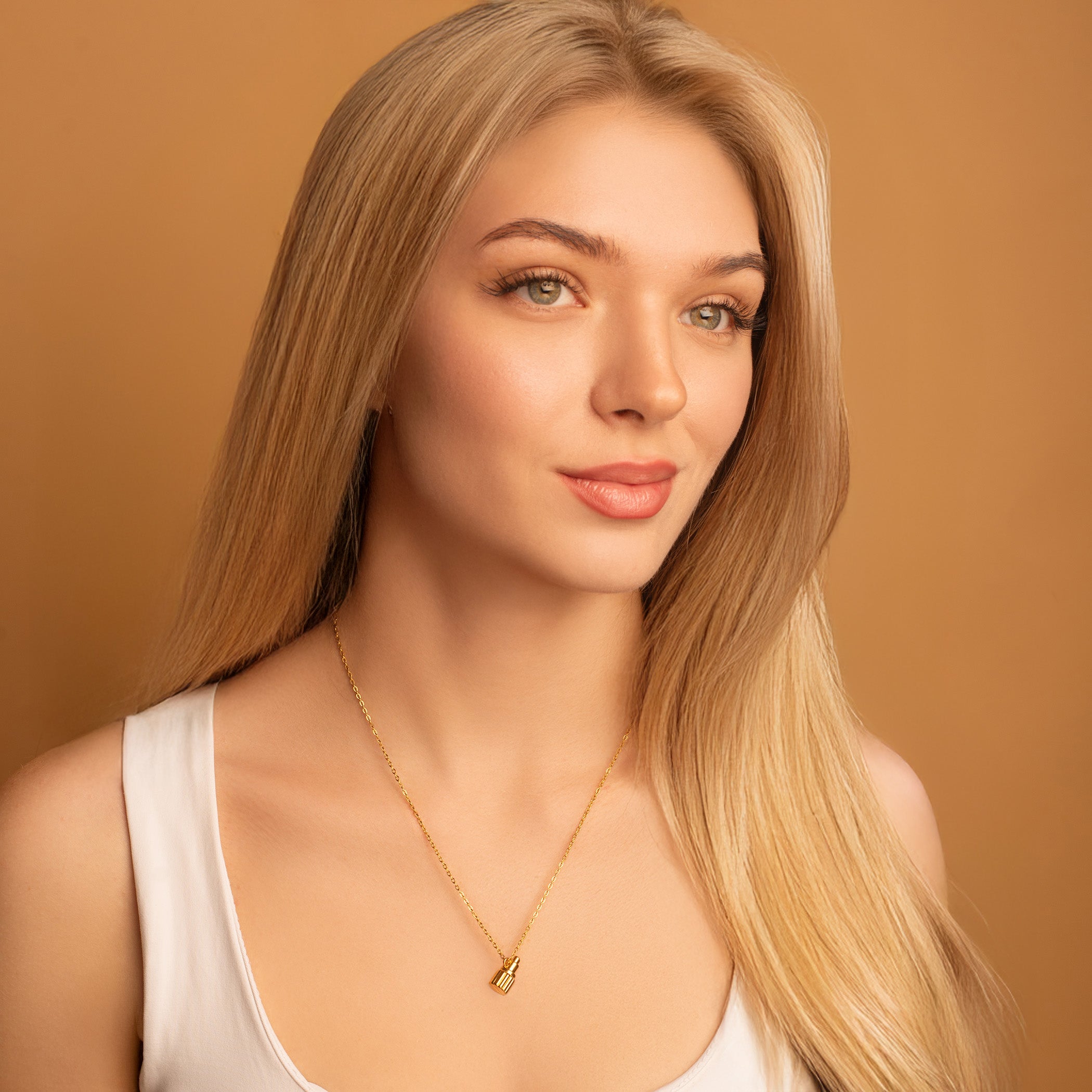 dainty gold lipstick necklace