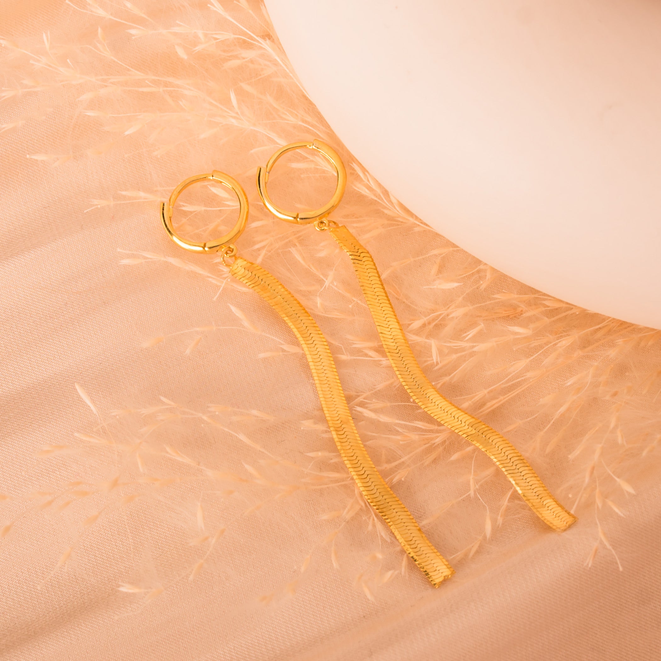 dangling gold snake chain hoop earrings