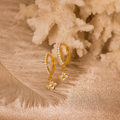 Gold hoop earrings with cz clover drops