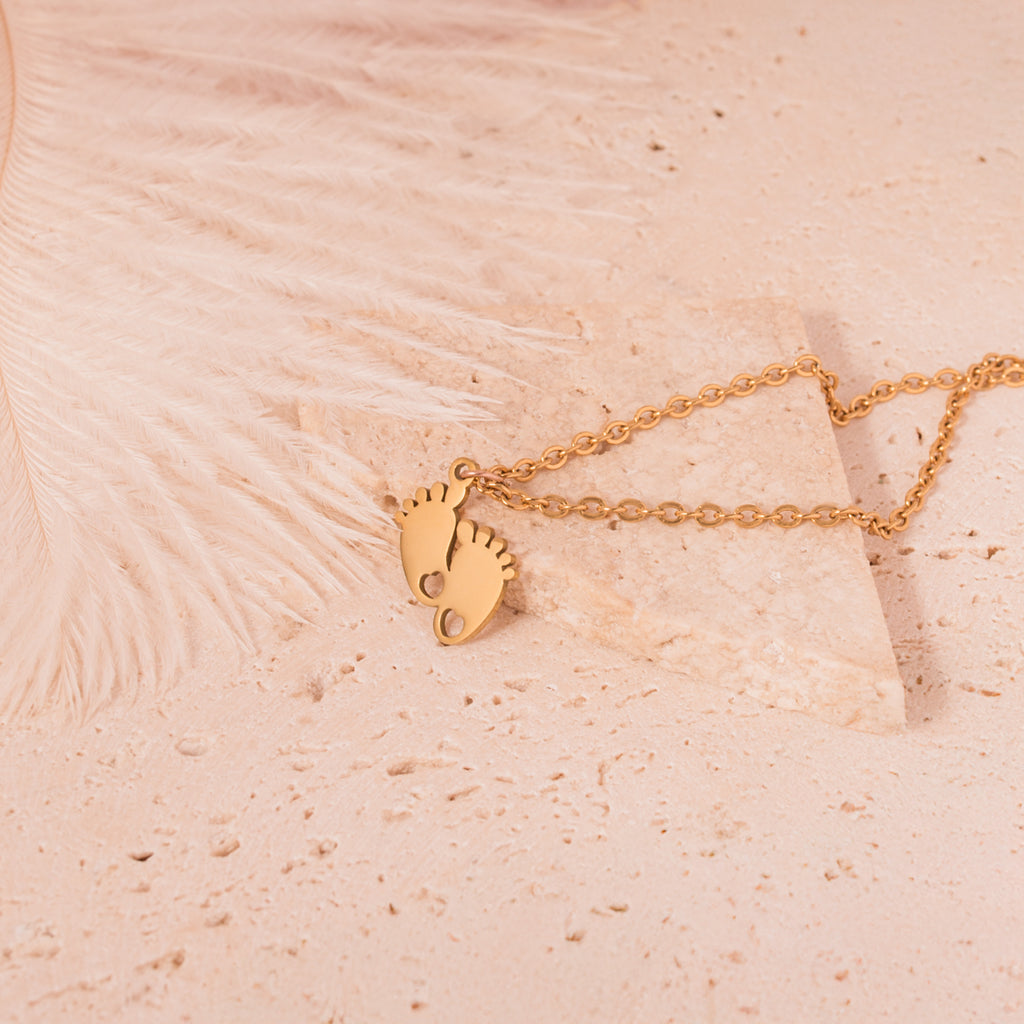 gold baby feet necklace