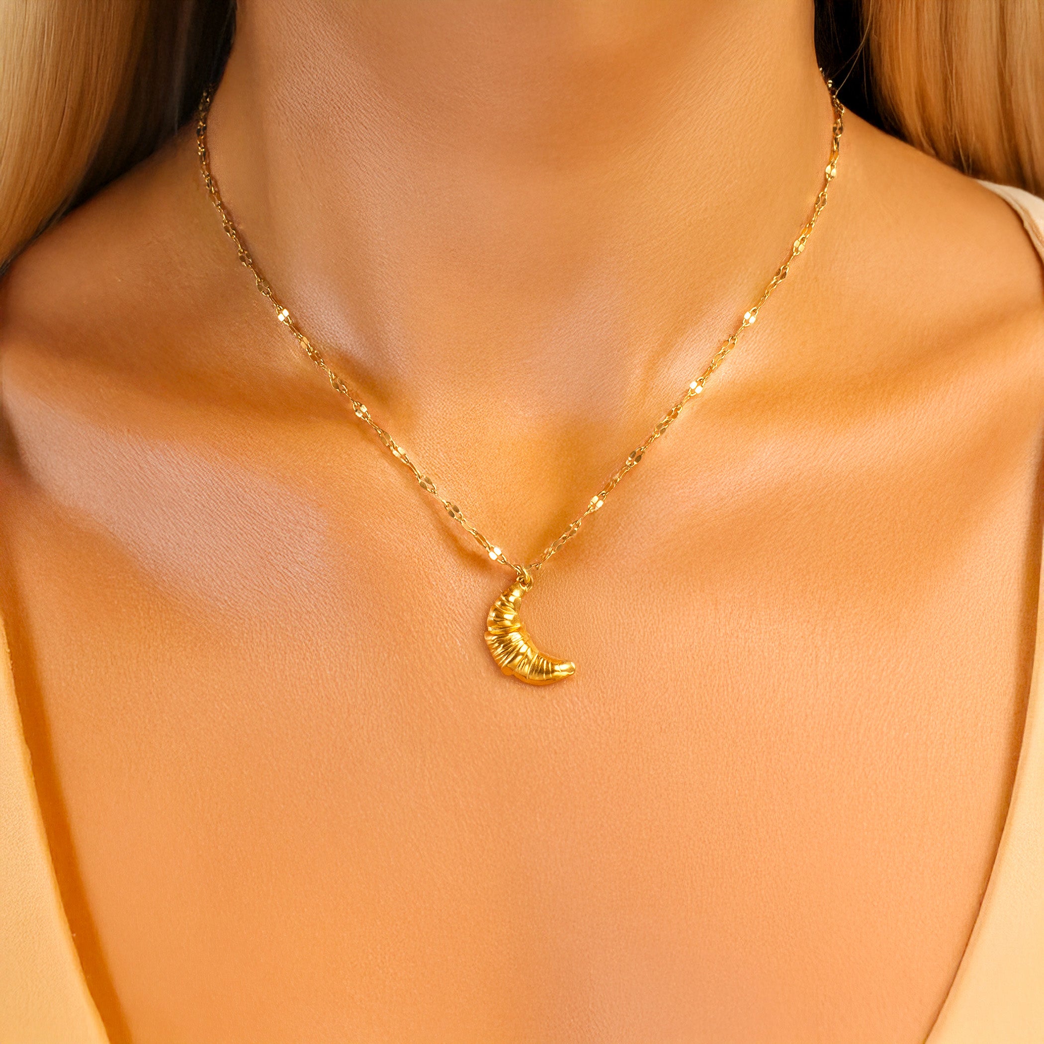 gold croissant necklace