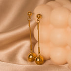 gold dangling earrings