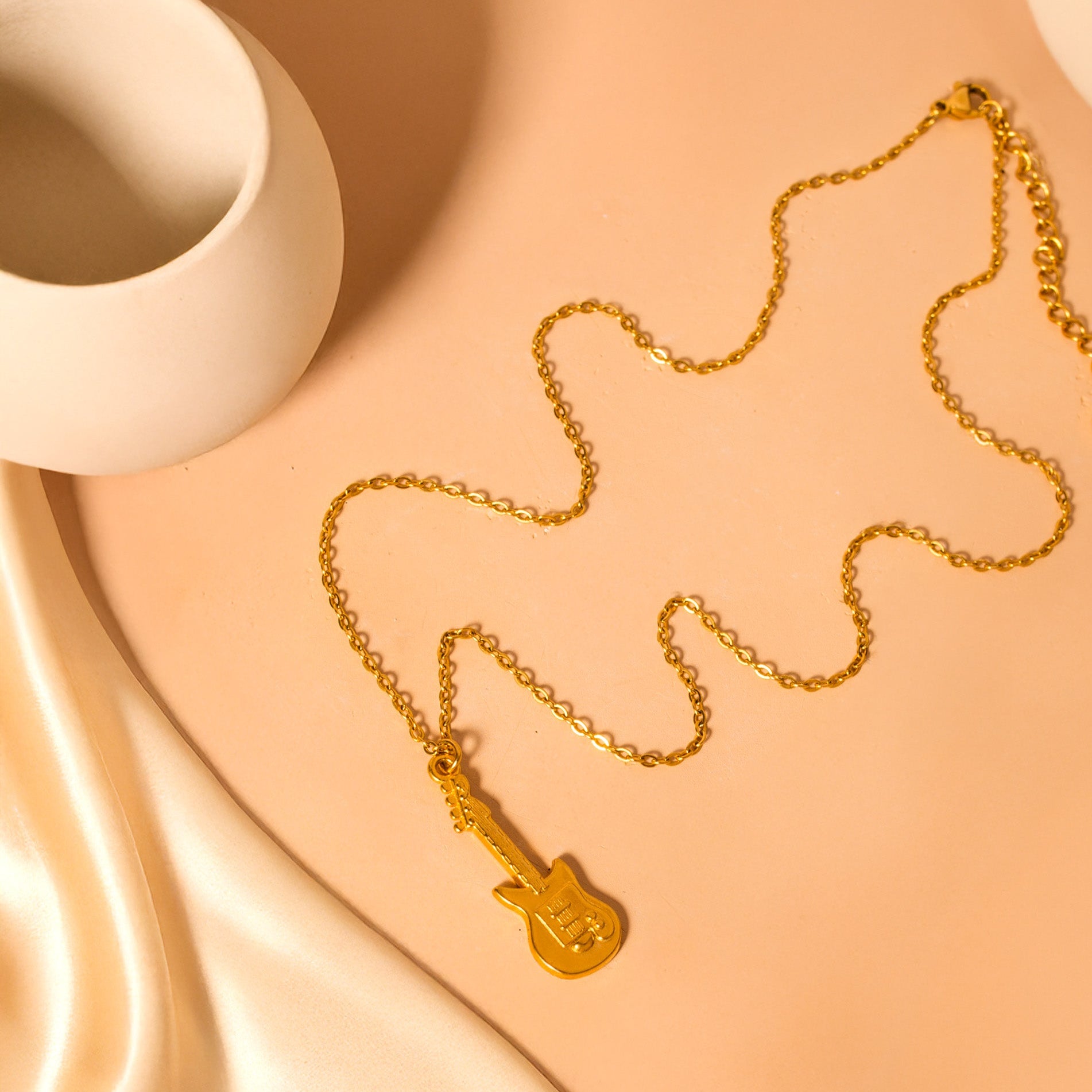 gold guitar necklace