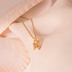 gold luggage necklace