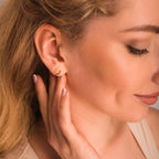 gold plane earrings