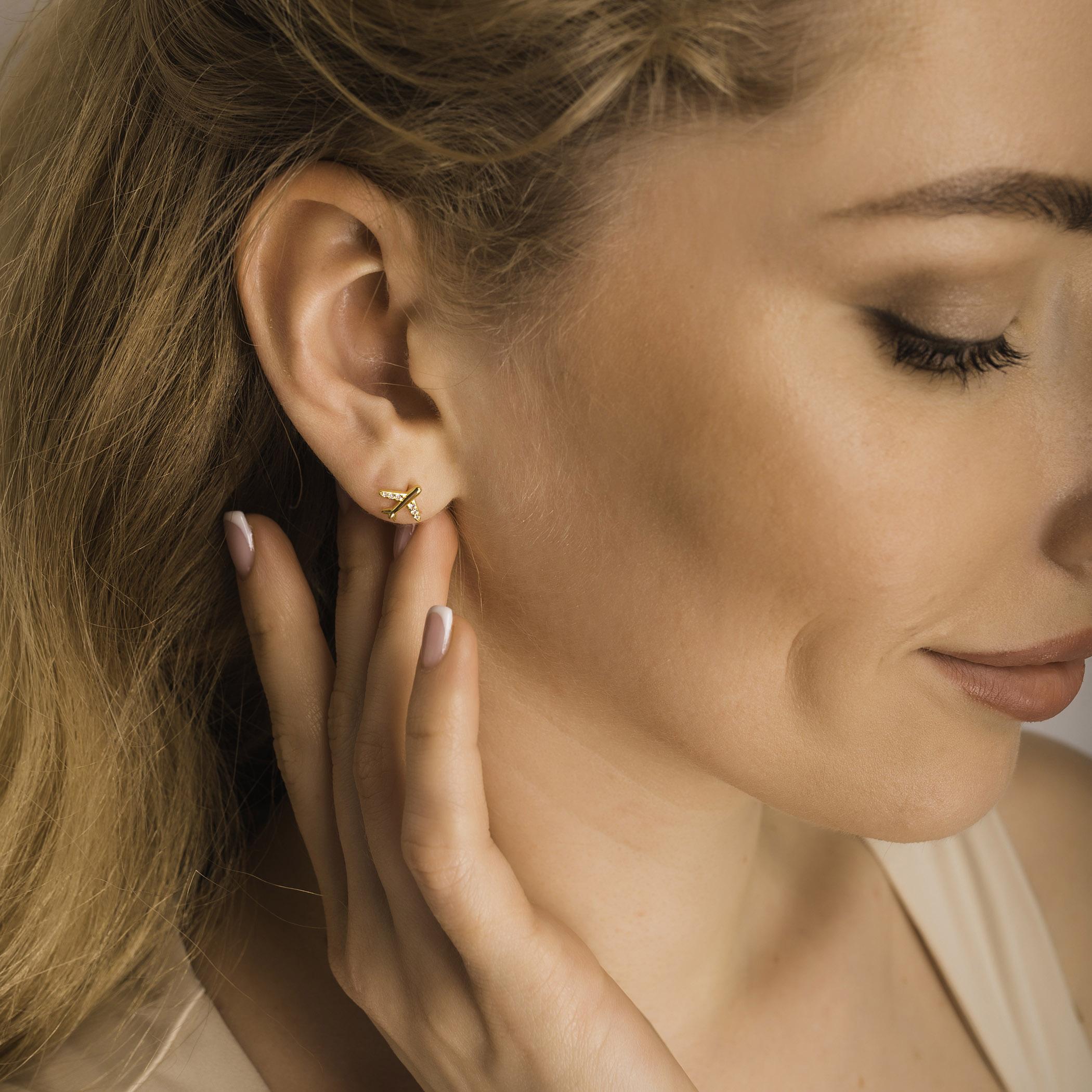 gold plane earrings