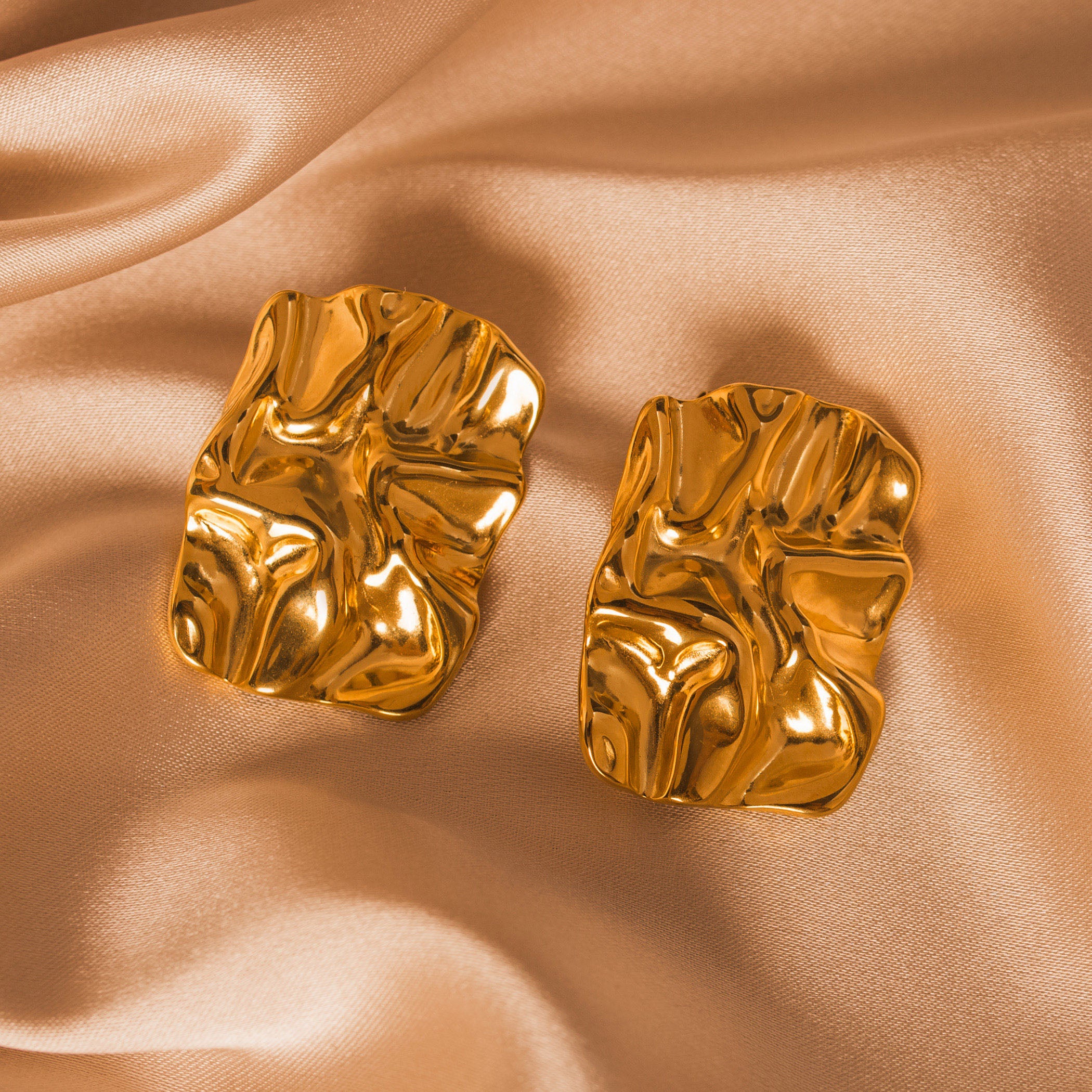 gold statement earrings