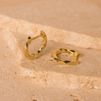 gold twisted huggie hoops