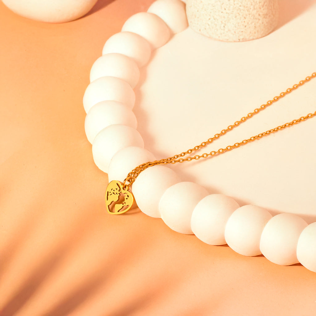 gold world heart necklace
