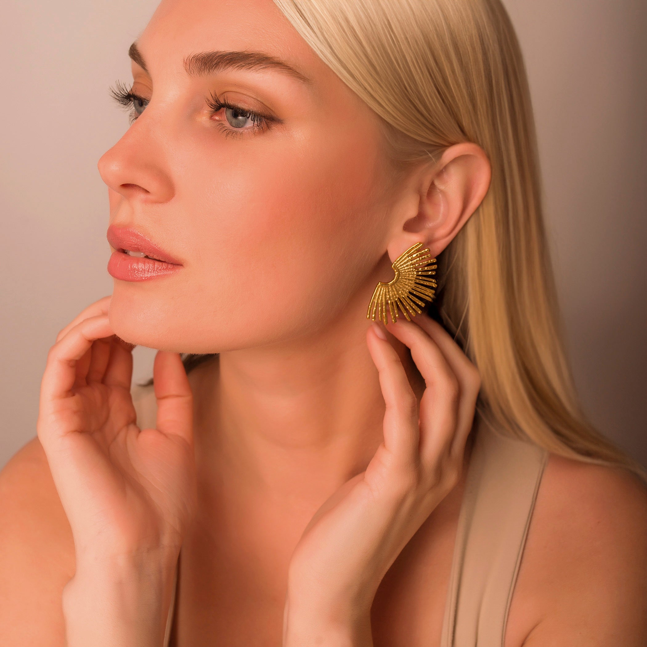 large gold sun earrings