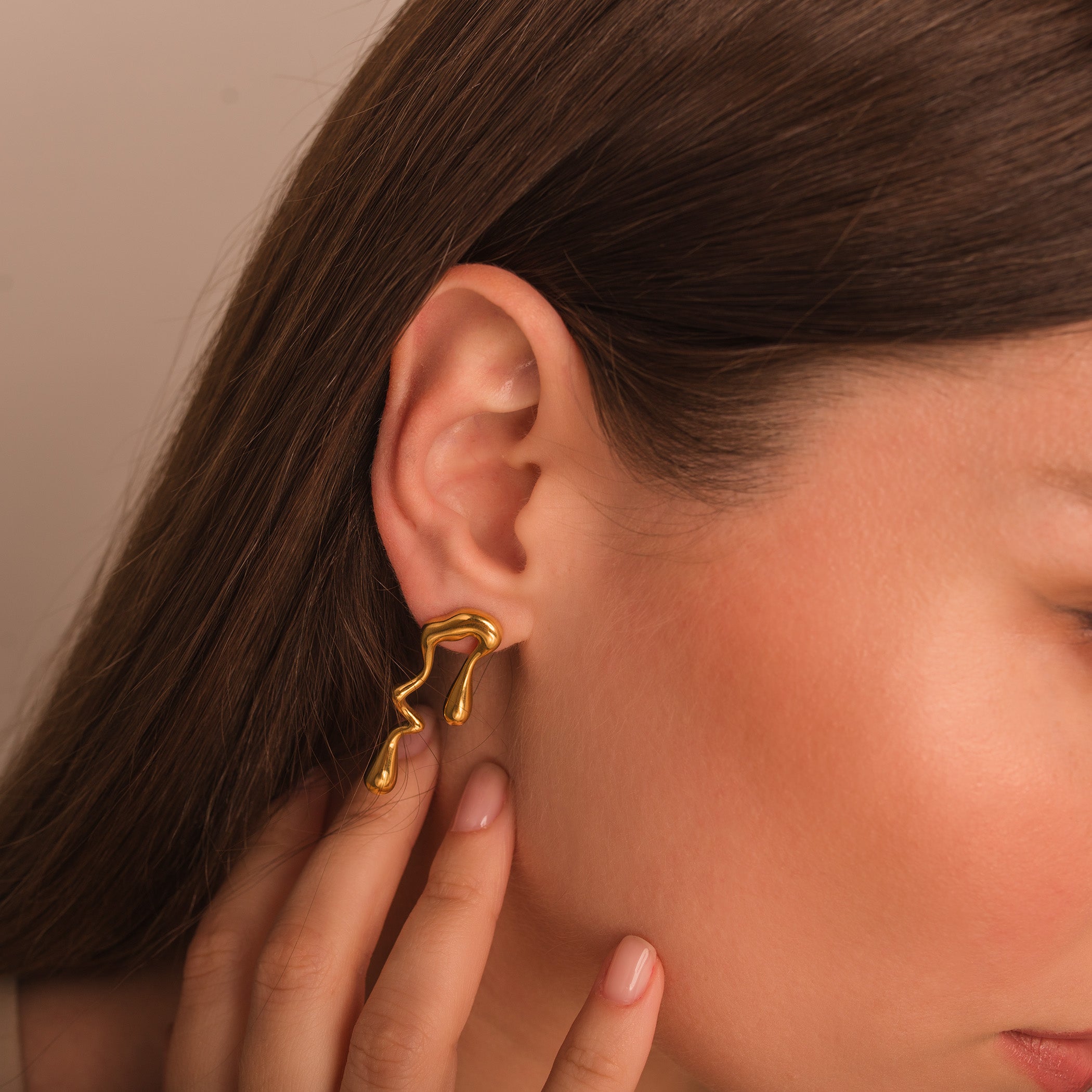 melting gold earrings