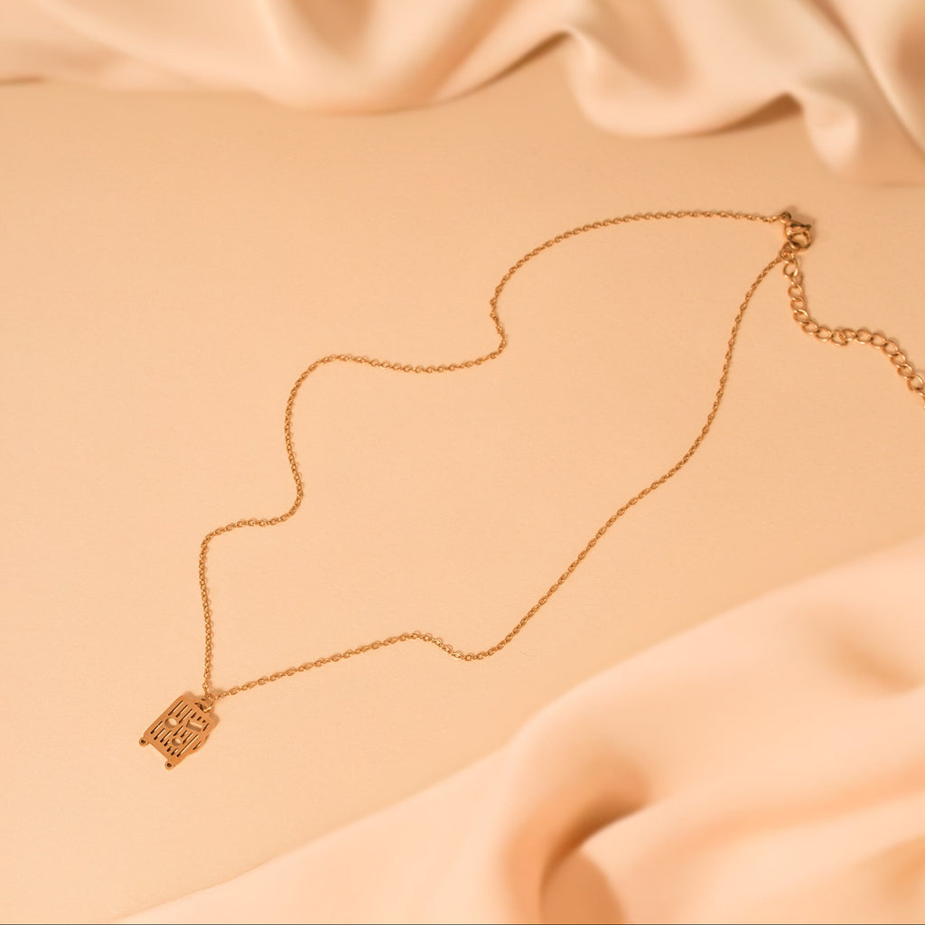 minimalist luggage gold necklace