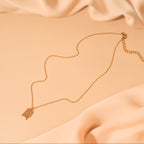 minimalist luggage gold necklace