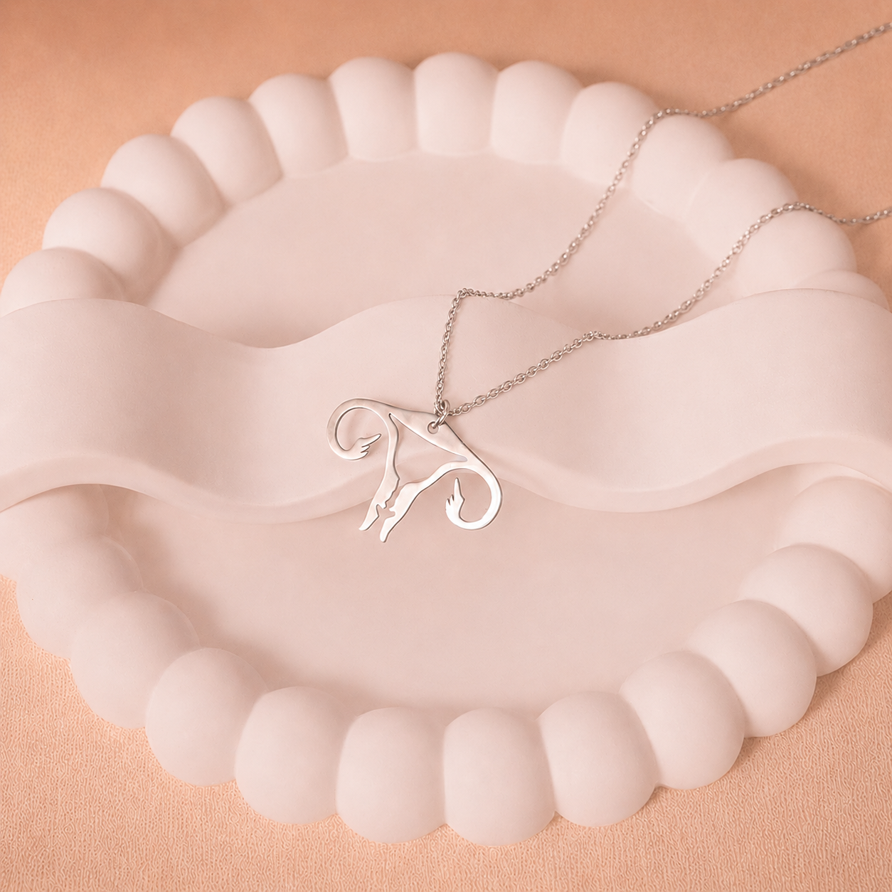 silver-uterus-necklace