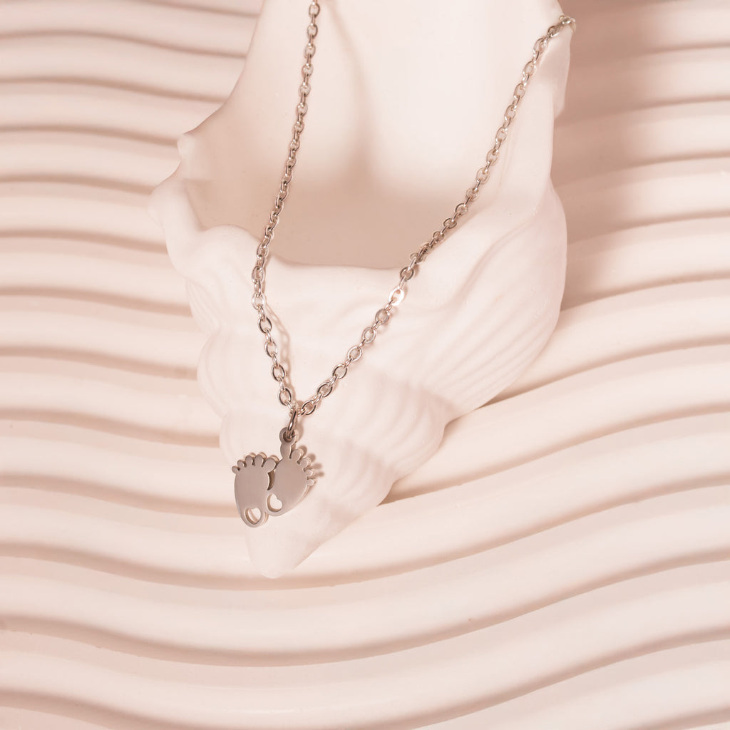 silver baby feet necklace