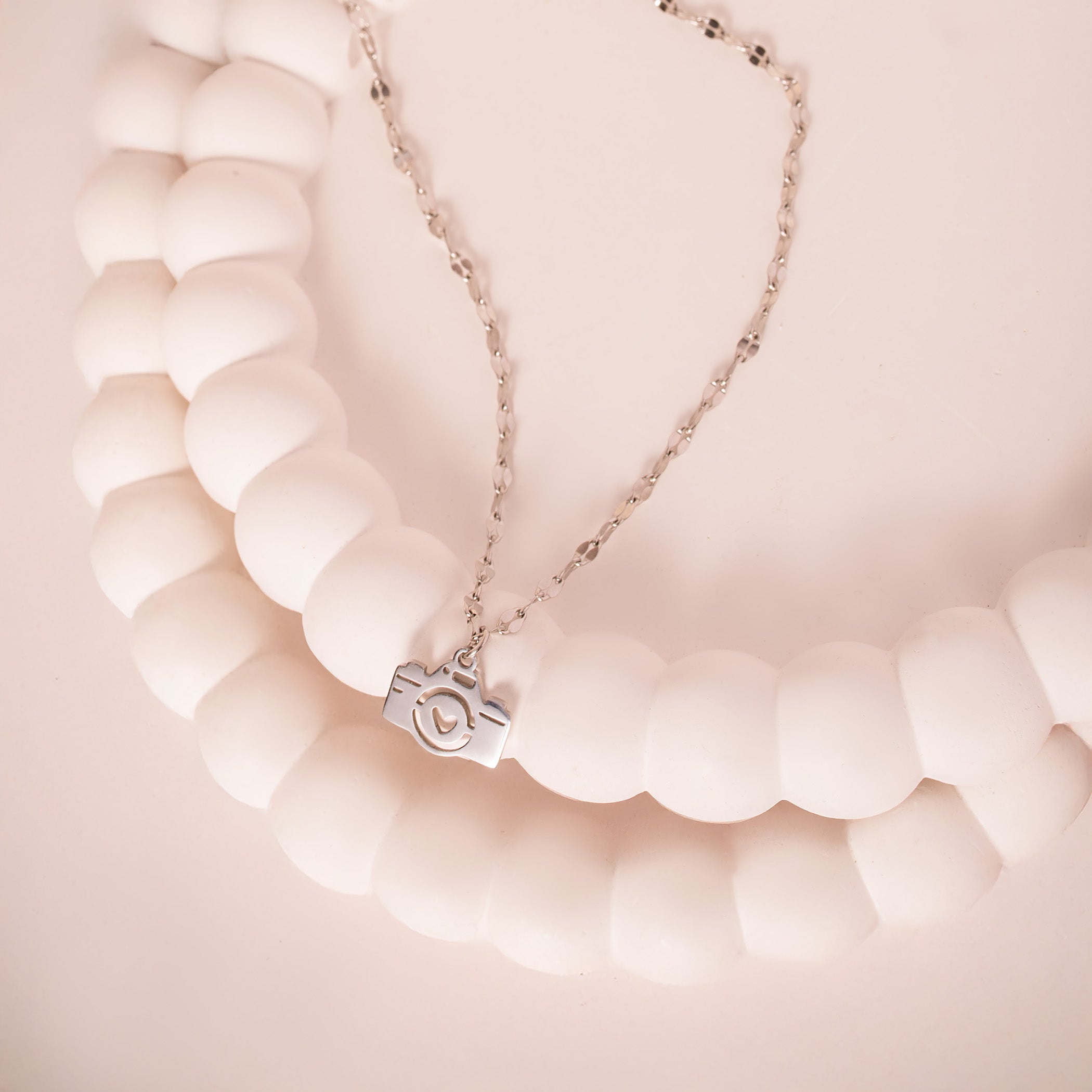 silver camera necklace