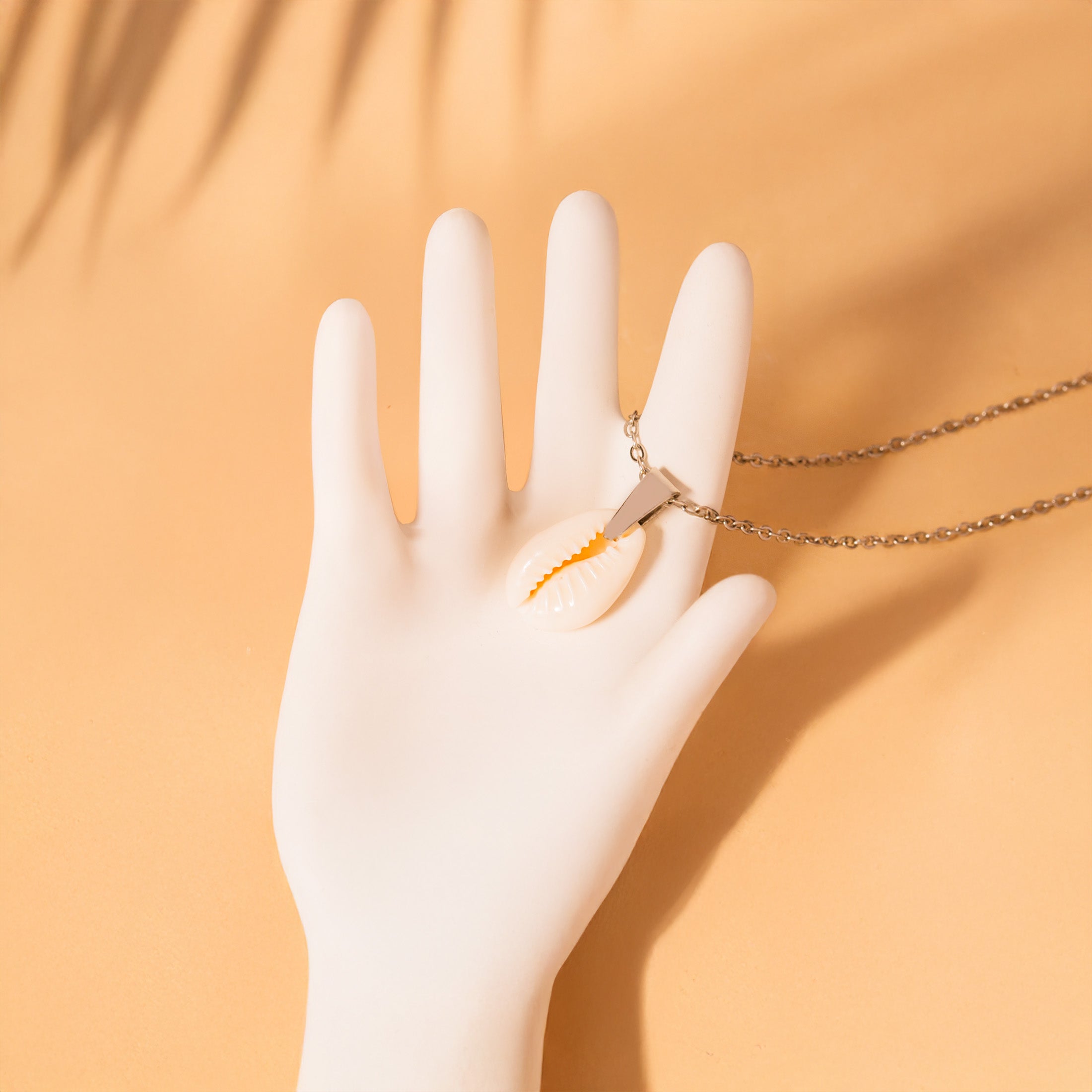 silver natural cowrie shell necklace