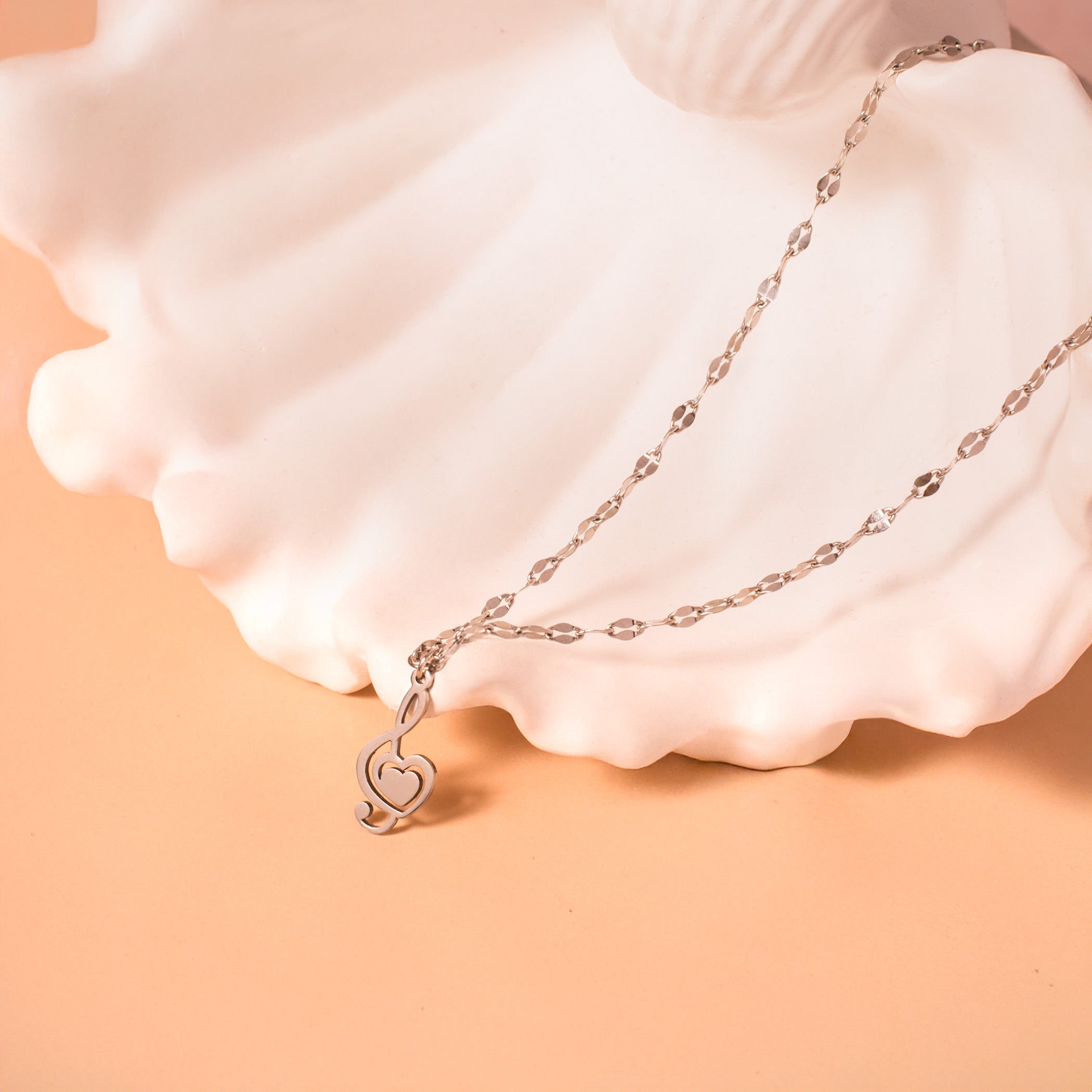 silver treble clef necklace