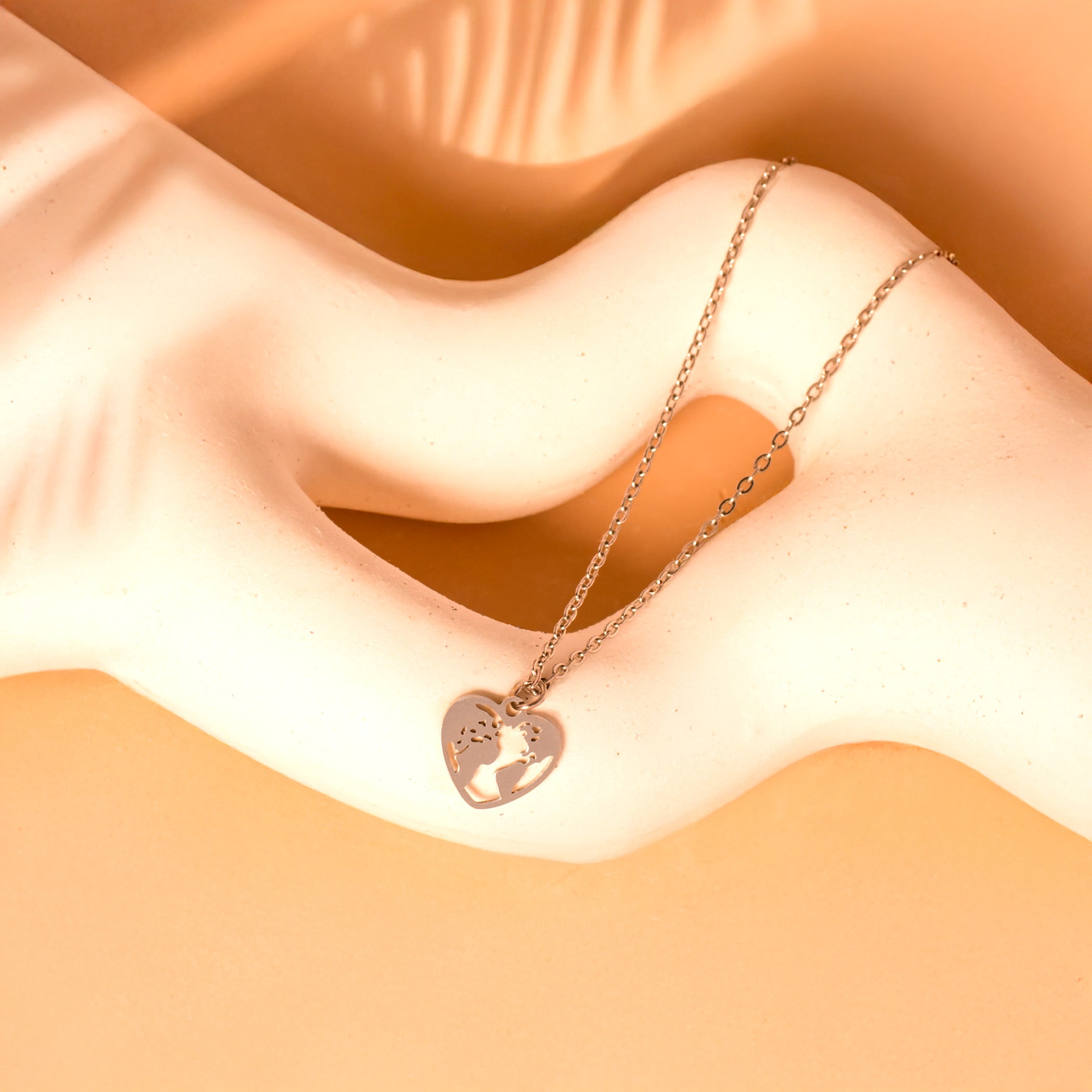 silver world heart necklace