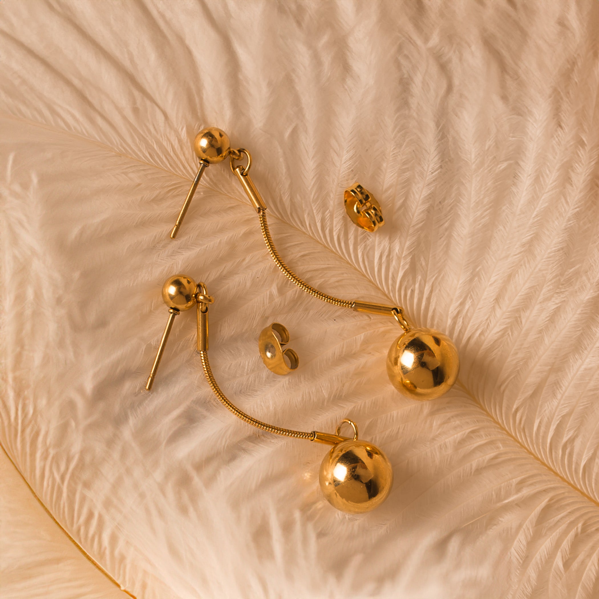 statement gold drop earrings
