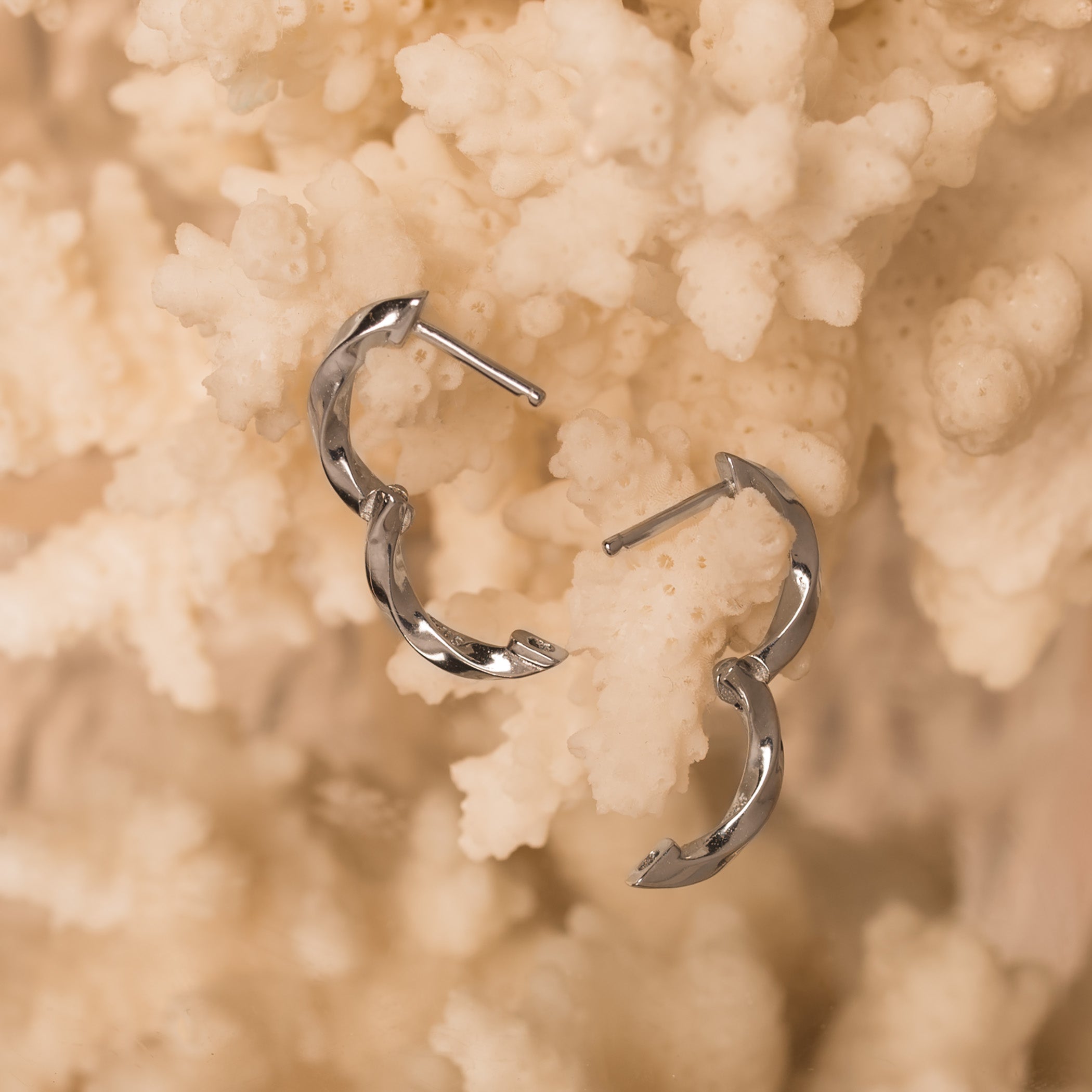 twisted silver huggie hoops