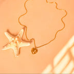 world heart charm necklace